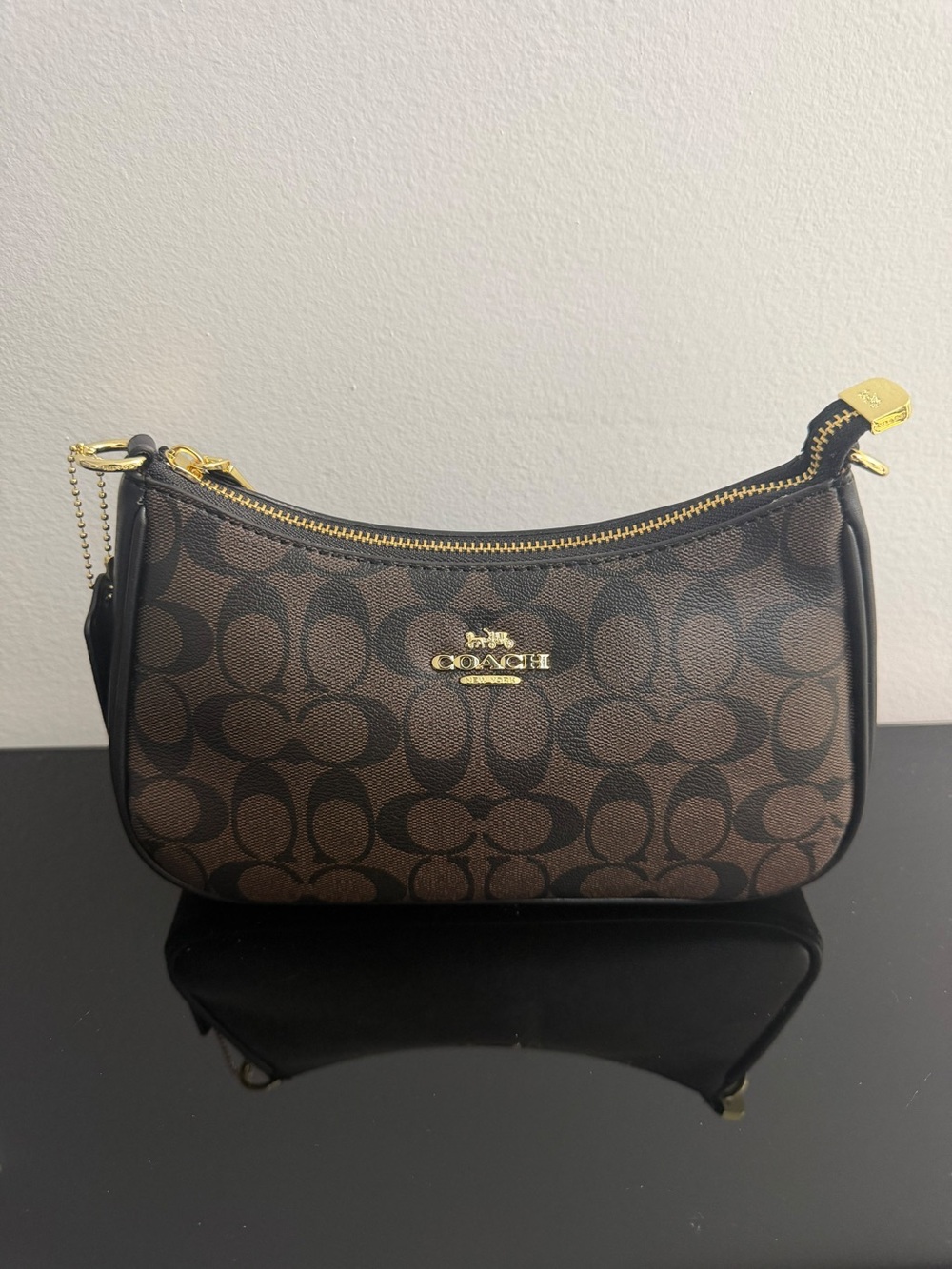 Coach Brown Signature Crescent Mini Wristlet with Gold Hardware